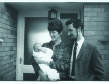 Vintage photo of Phyllis Foster Satter ’62 and Keith Johnson ’62 holding their baby